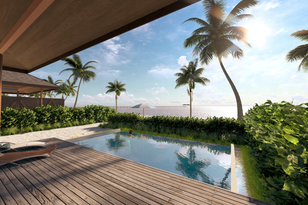 Island resort among tropical trees beside the water